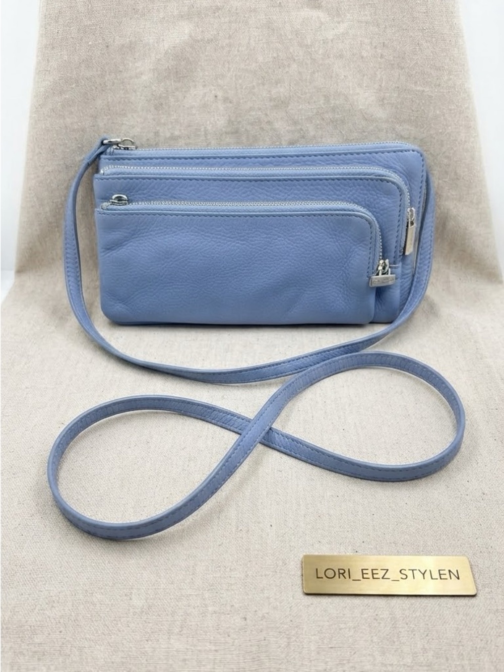 Brand new without tags Danier Light Blue Crossbody Wallet